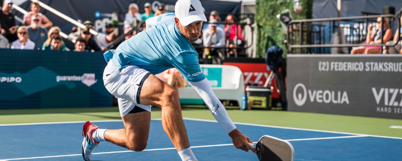 Federico Staksrud goes to hit a backhand.