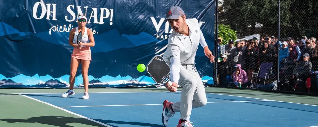 Ben Johns hits a backhand.