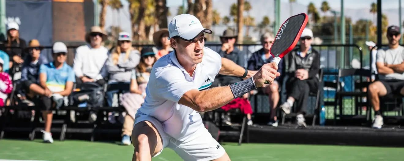 Christian Alshon hits a forehand volley.