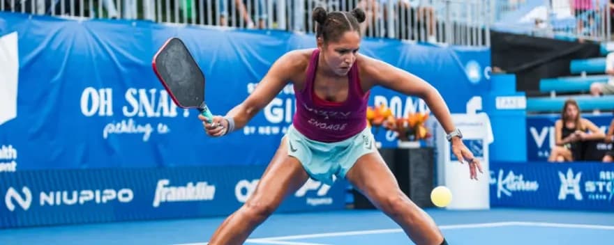 Jessie Irvine hits a forehand.