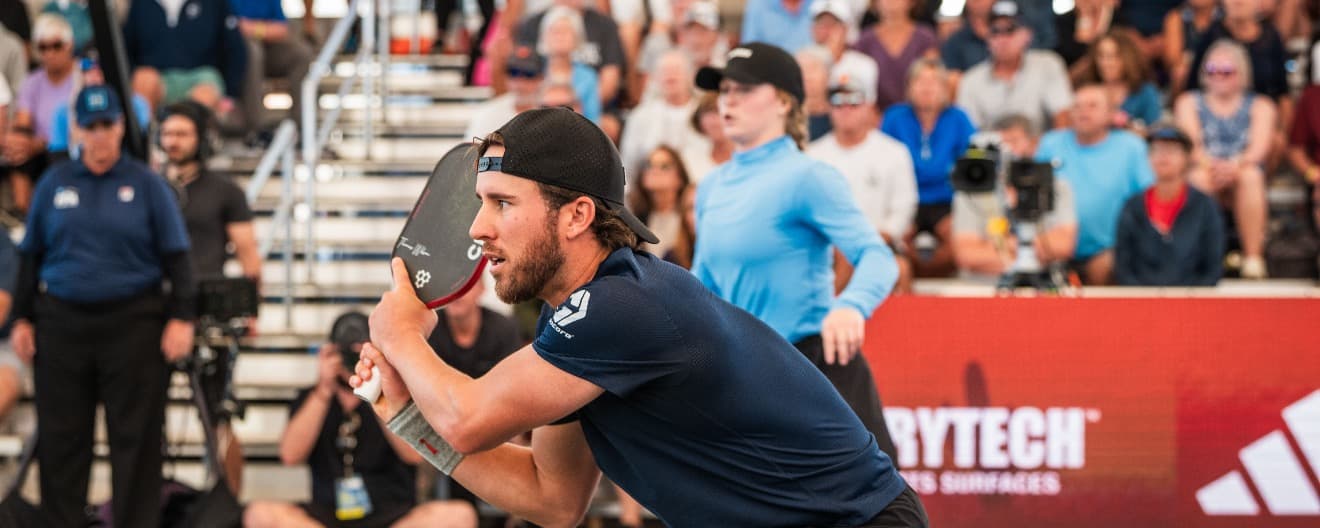 Thomas Wilson and Vivienne David playing mixed doubles.