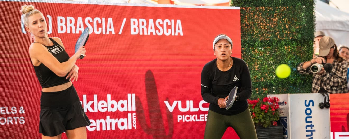 Meghan Dizon and Etta Wright playing pickleball on center court at Mesa Arizona Cup.