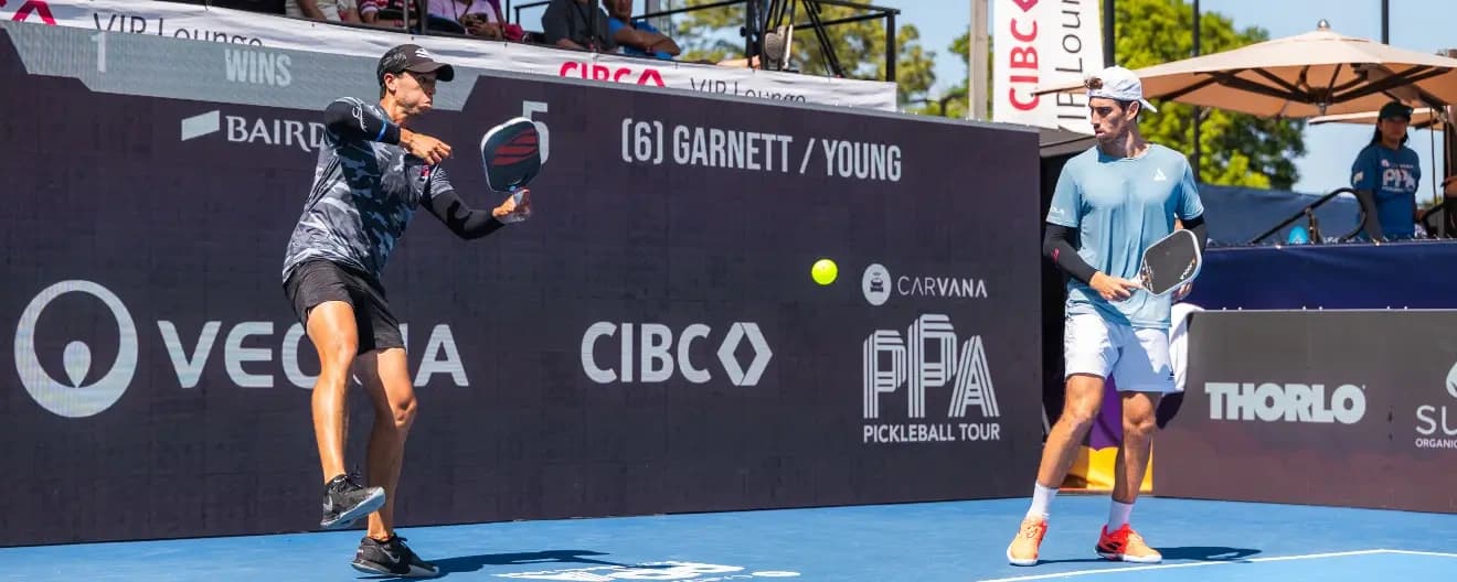 Pablo Tellez and Federico Staksrud playing pickleball.