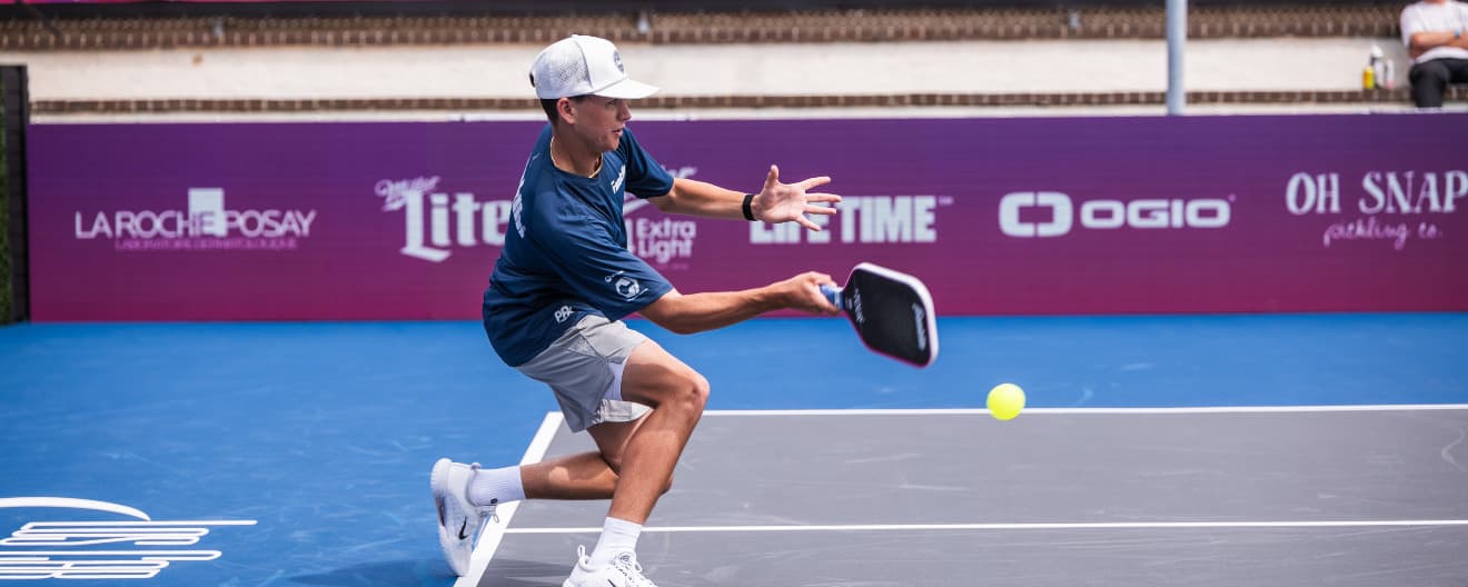 Hayden Patriquin hits a pickleball forehand.