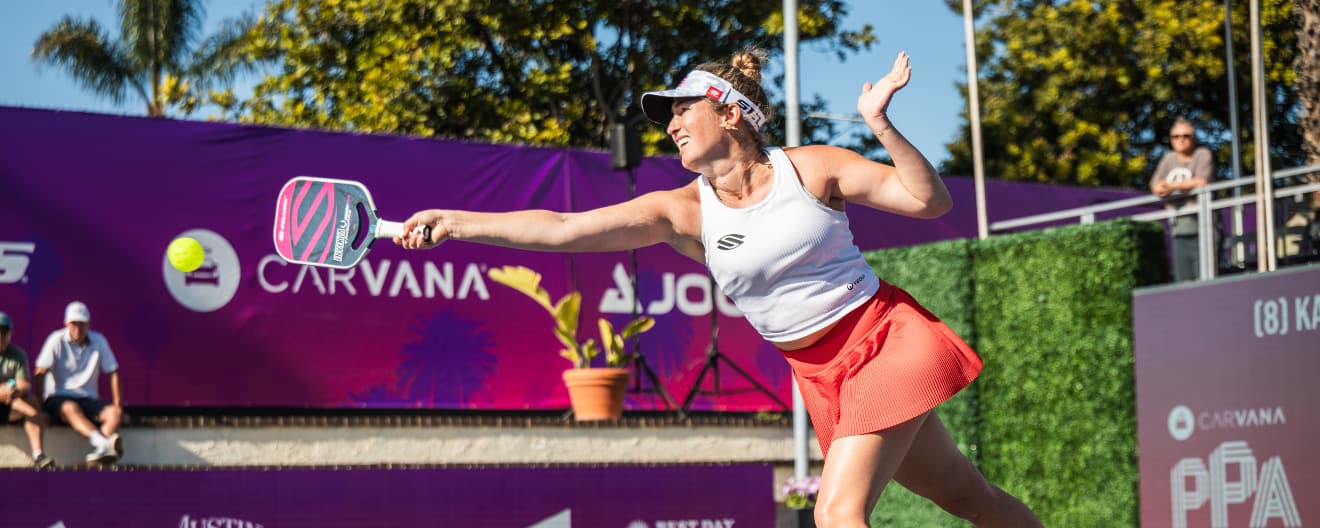 Lauren Stratman hits a pickleball volley.