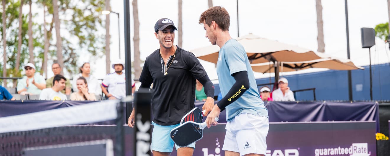 Pablo Tellez and Federico Staksrud playing pickleball.