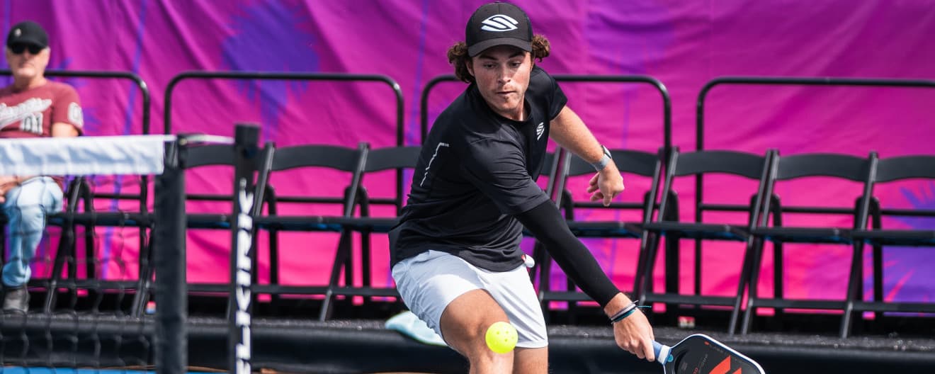 Rio Newcombe hits a pickleball backhand.