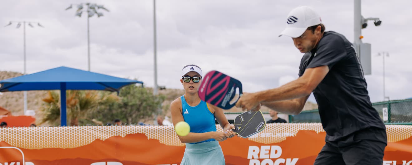 James Ignatowich hits a pickleball backhand.