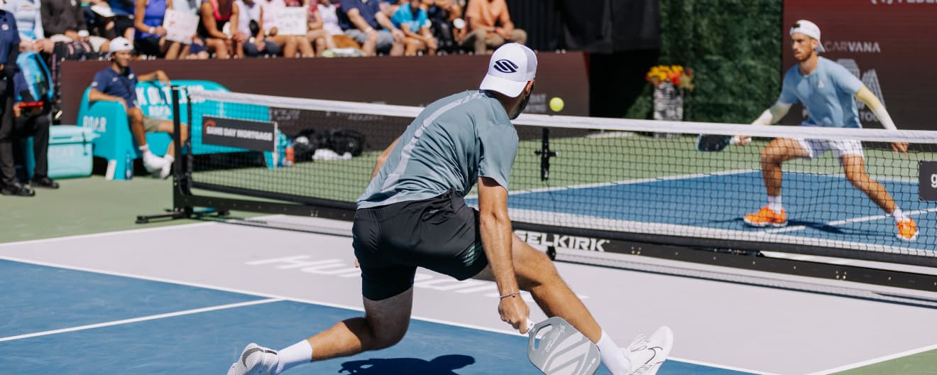 Jack Sock and Federico Staksrud playing pickleball singles.