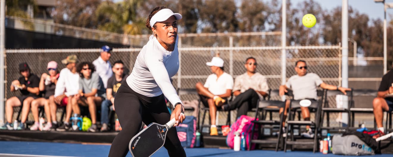 Etta Wright hits a pickleball forehand.