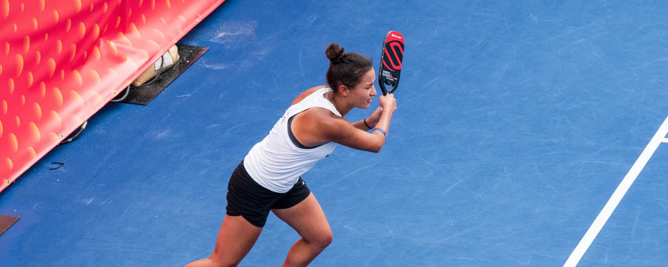 Jade Kawamoto hits a backhand.
