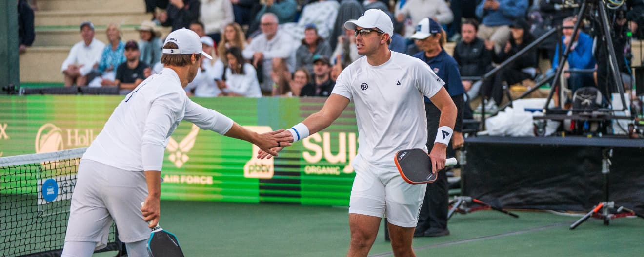Ben and Collin Johns celebrate a point at the PPA Masters.