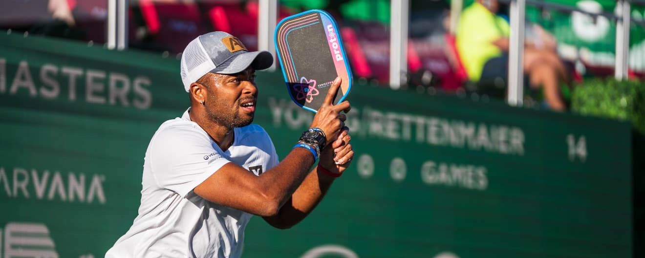 Donald Young hits a backhand.