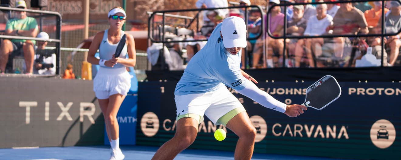 Ben Johns hits a backhand dink.