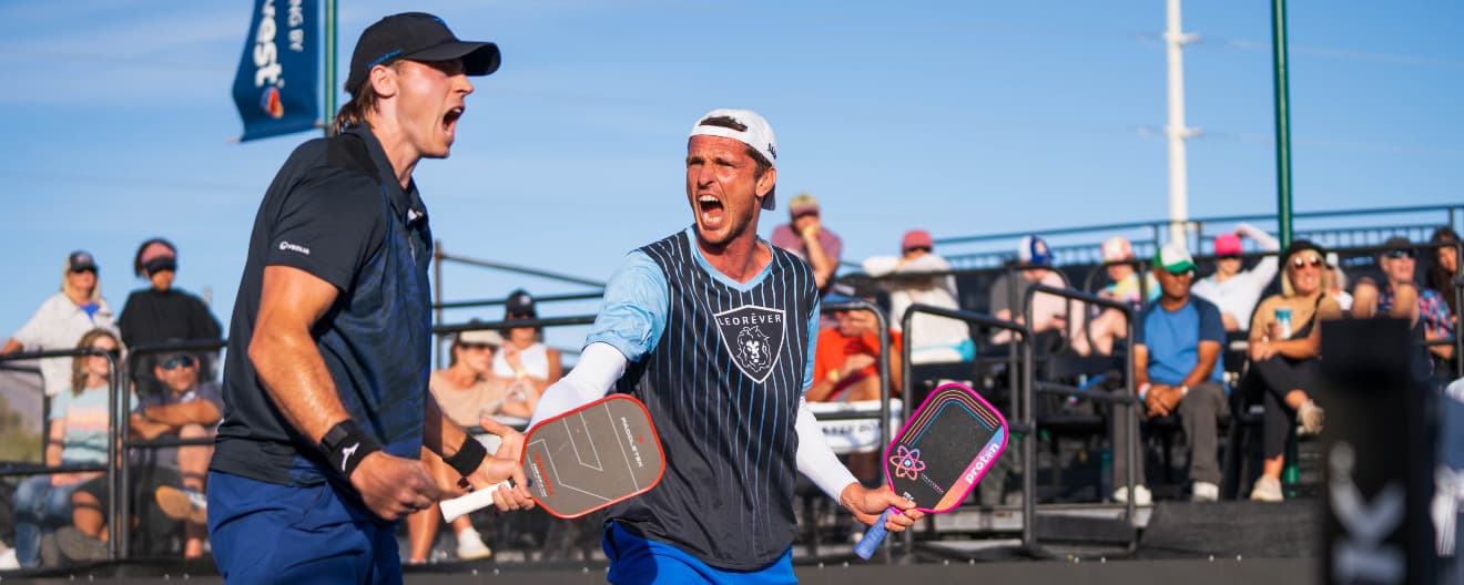 Christian Alshon and Andrei Daescu celebrate their victory in men's doubles.