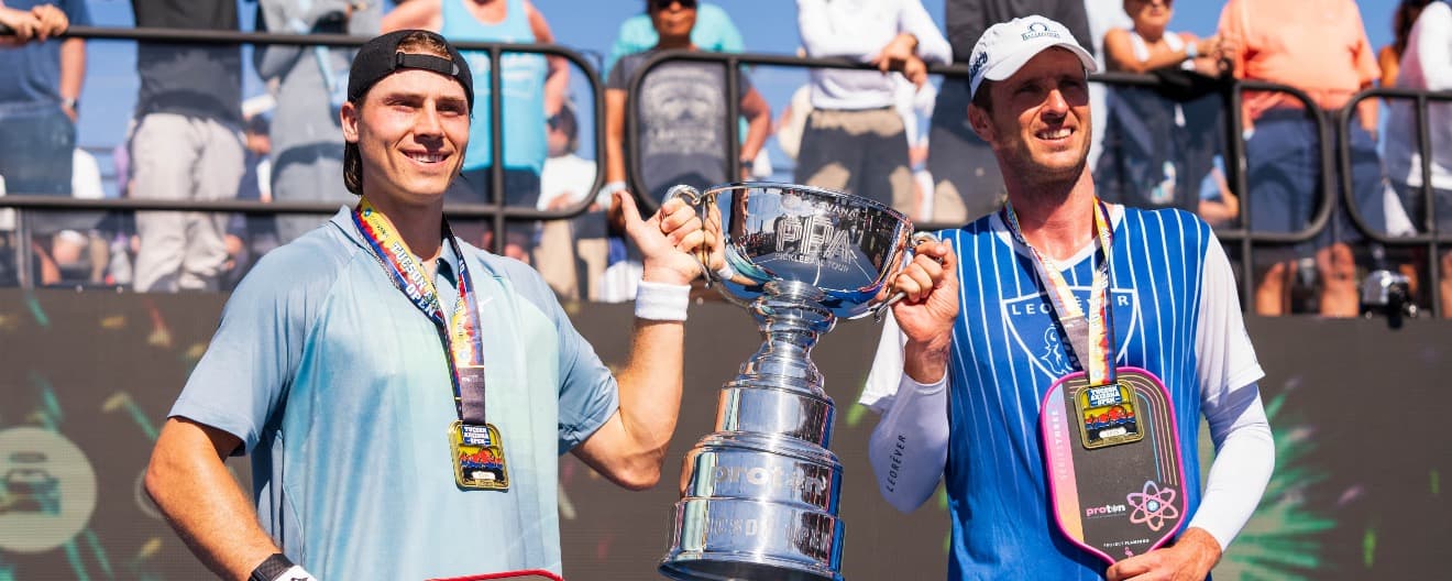 Christian Alshon and Andrei Daescu celebrate their men's doubles championship on Sunday.