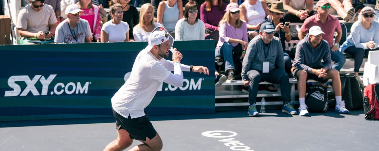 Jack Sock hitting a pickleball forehand.