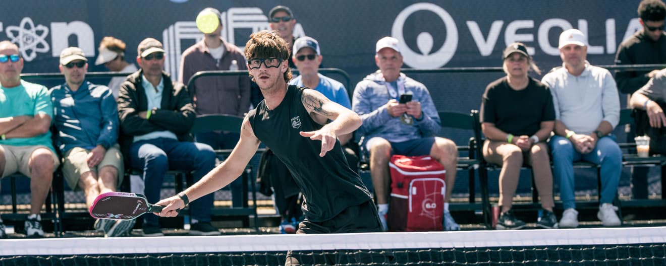 Zane Ford hitting a pickleball forehand.