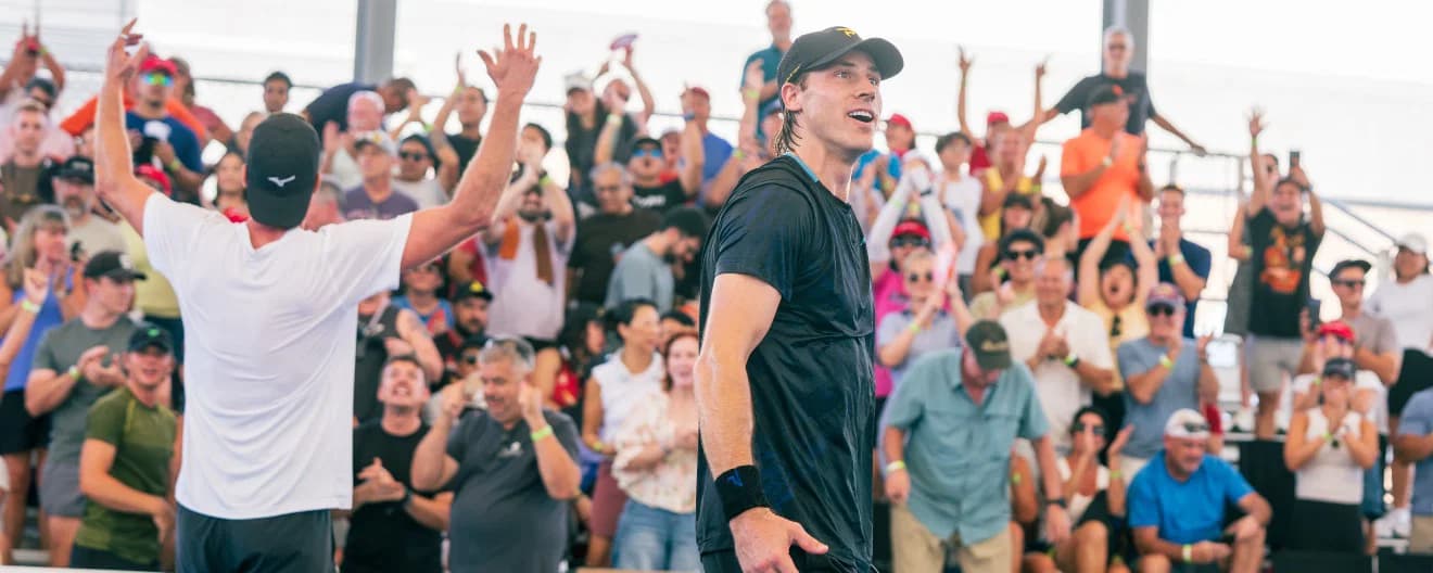 Christian Alshon and Andrei Daescu celebrating their men's doubles title at the Veolia Arizona Open in Mesa, AZ.