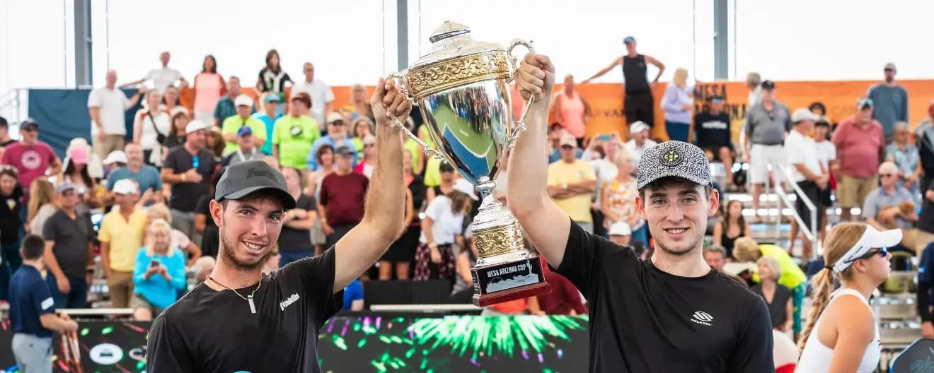 JW Johnson and Dylan Frazier hold up the trophy after winning at the Mesa Arizona Cup.
