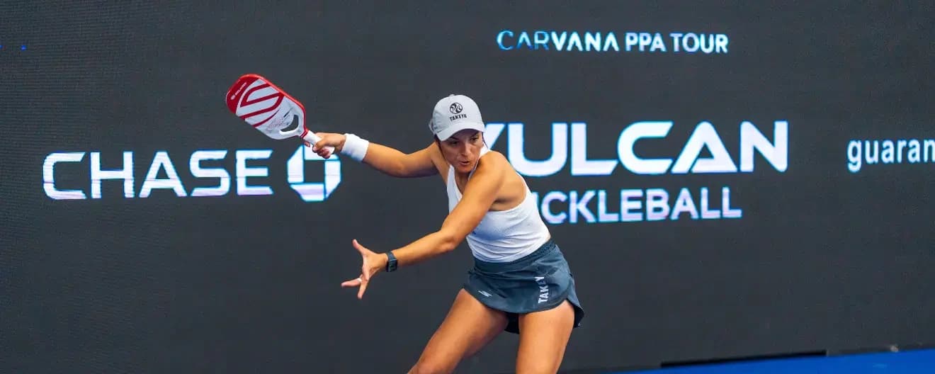 Catherine Parenteau prepares to hit a forehand in pickleball.