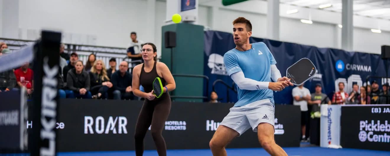 Federico Staksrud hits a backhand.