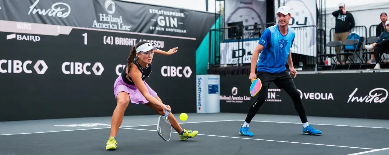 Anna Bright and Andrei Daescu playing pickleball.