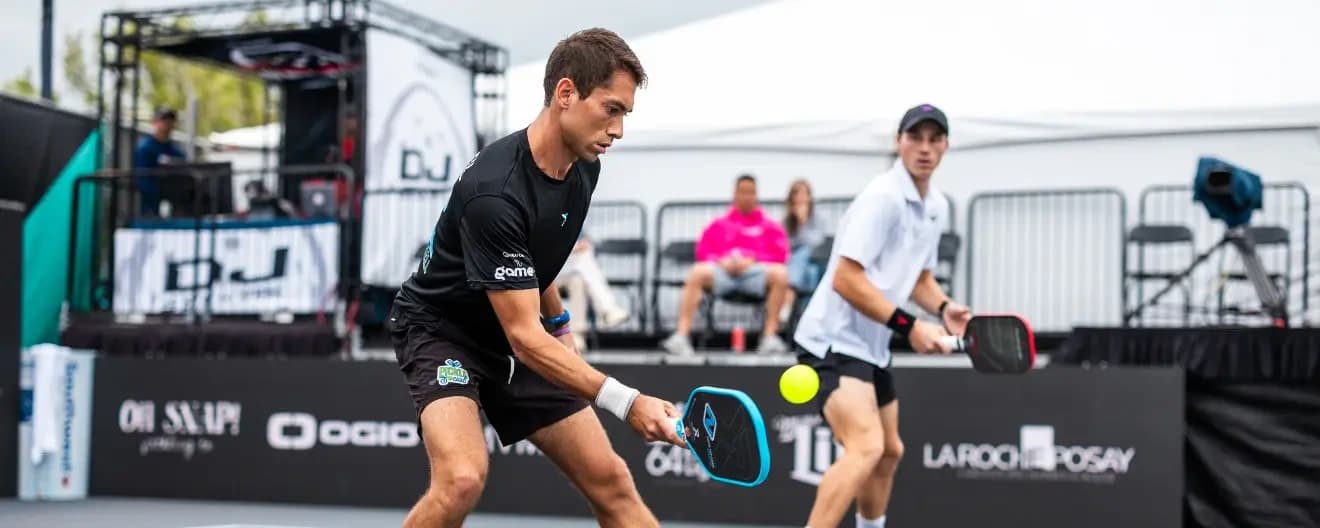 Zane Navratil and Christian Alshon playing pickleball.