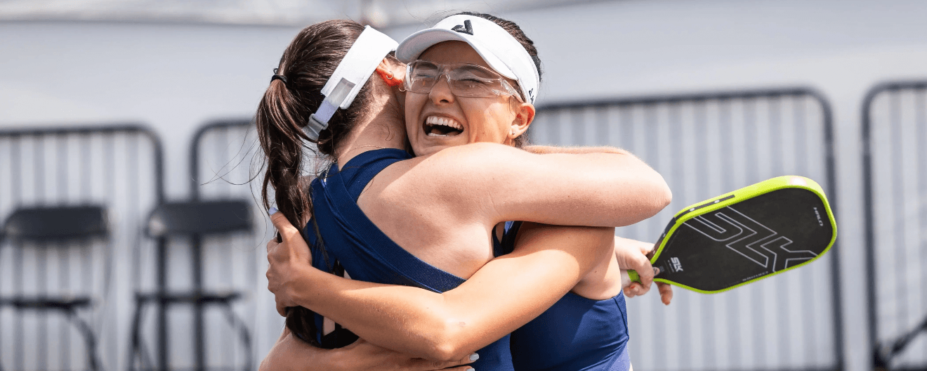 Anna Bright and Rachel Rohrabacher celebrate their women's doubles championship in Austin.