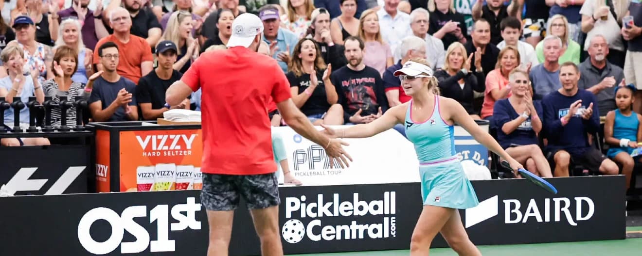 Jack Sock and Anna Leigh Waters celebrate a victory in pickleball.