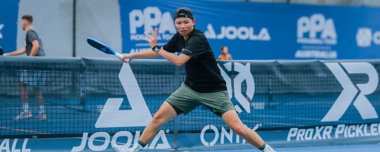Pei Chuan Kao hits a pickleball forehand.