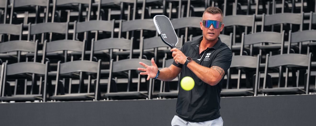 Martin Emmrich hitting a pickleball.