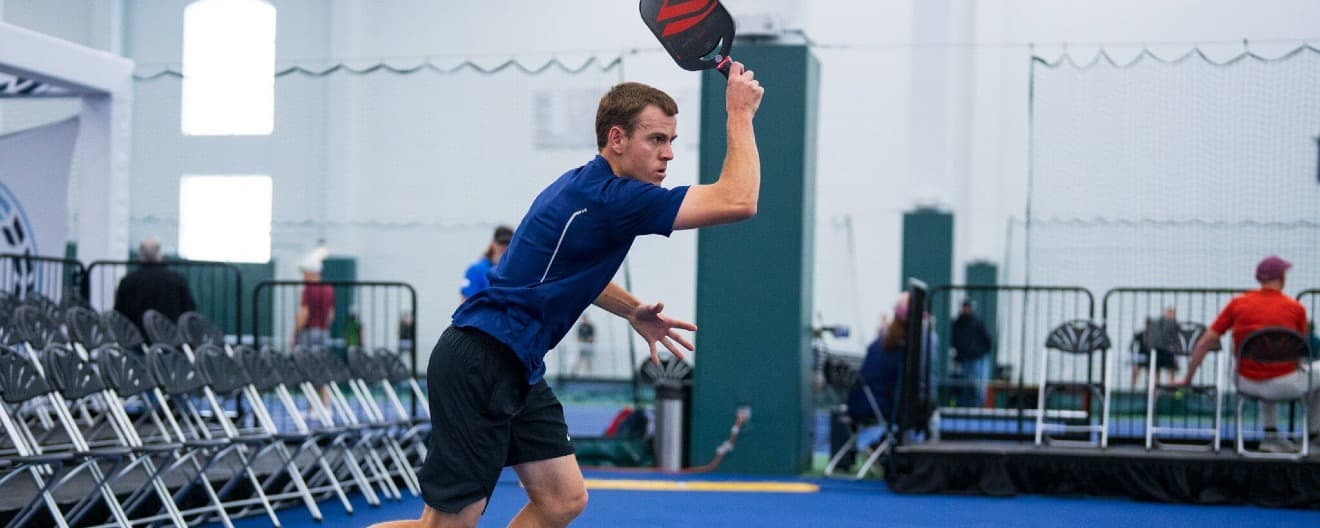 Action shot of Todd Fought playing pickleball