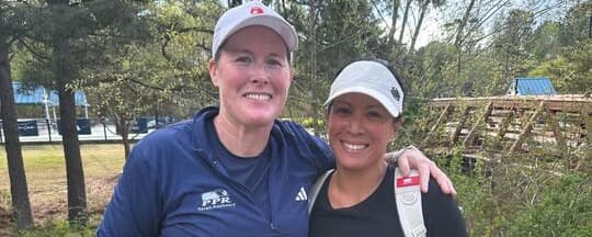 Audrey Banada and Sarah Ansboury smiling together.