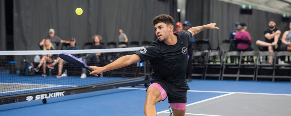 Jaume Martinez Vich hitting a backhand shot