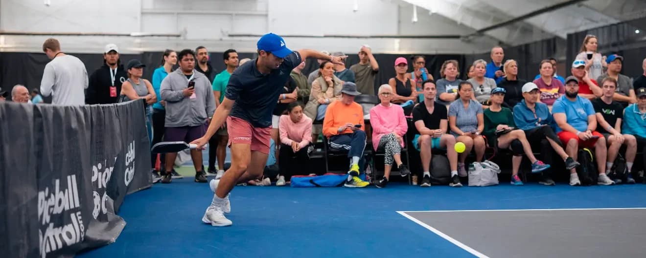 Ben Johns hits a pickleball forehand.