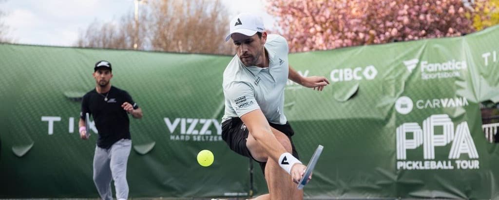 Dekel Bar playing men's doubles with Tyson McGuffin.