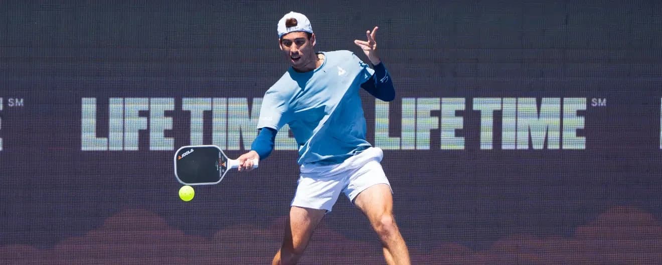 Federico Staksrud hits a pickleball forehand.