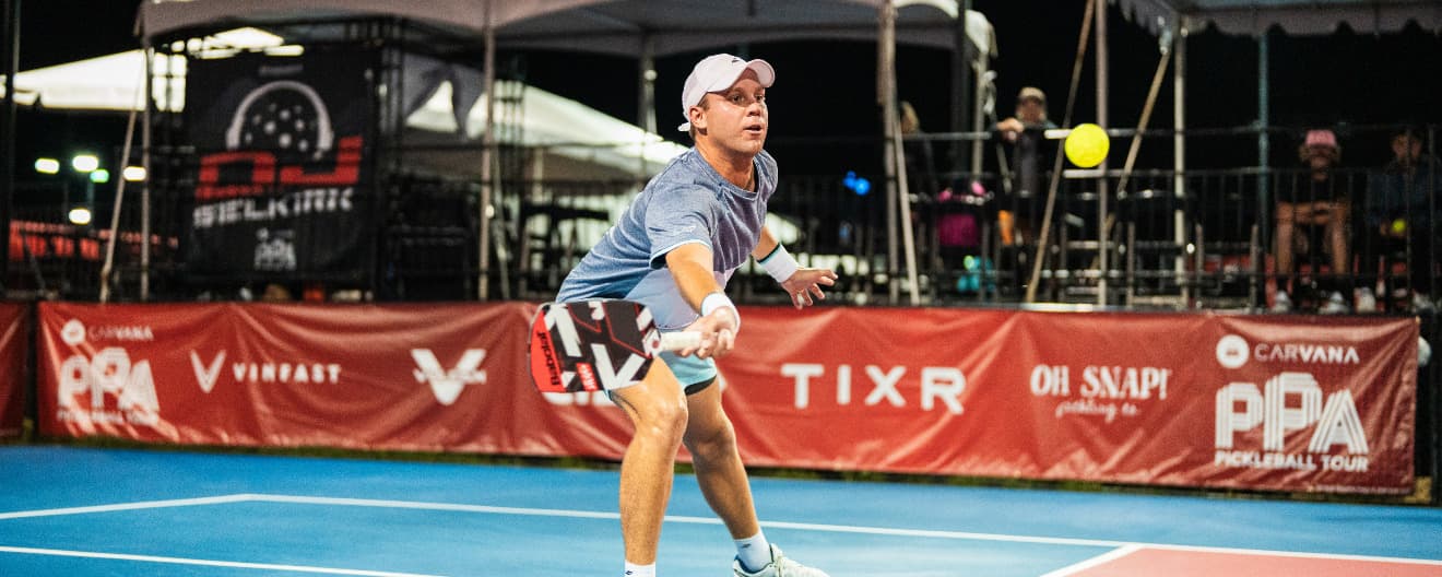 Chris Haworth hits a forehand volley.