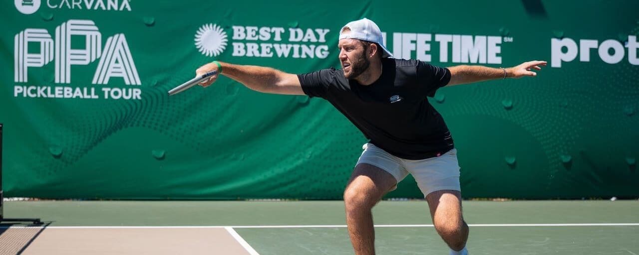 Jack Sock hitting a forehand flick