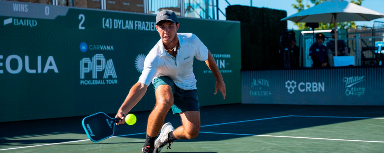JW Johnson hits a forehand drop.