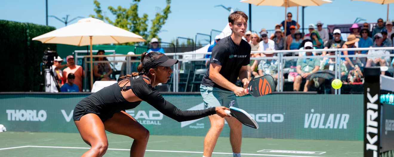 Hurricane Tyra Black hits a forehand dink.