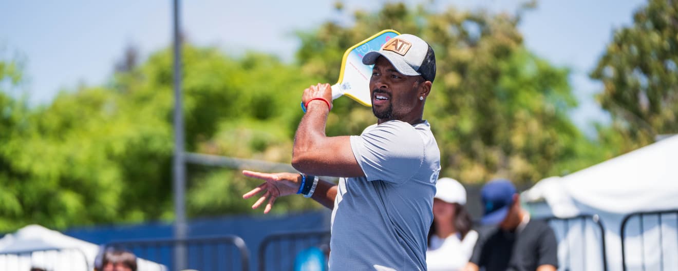 Donald Young hits a forehand.