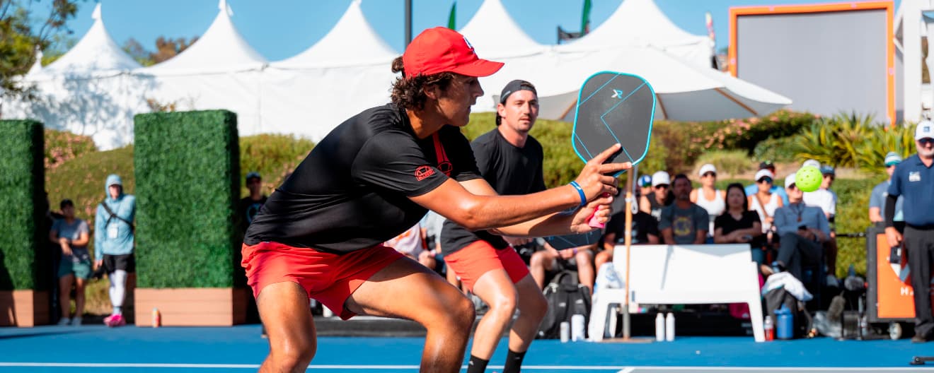Jack Munro hits a backhand dink.