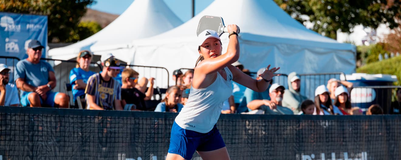 Zoey Wang hits a forehand.