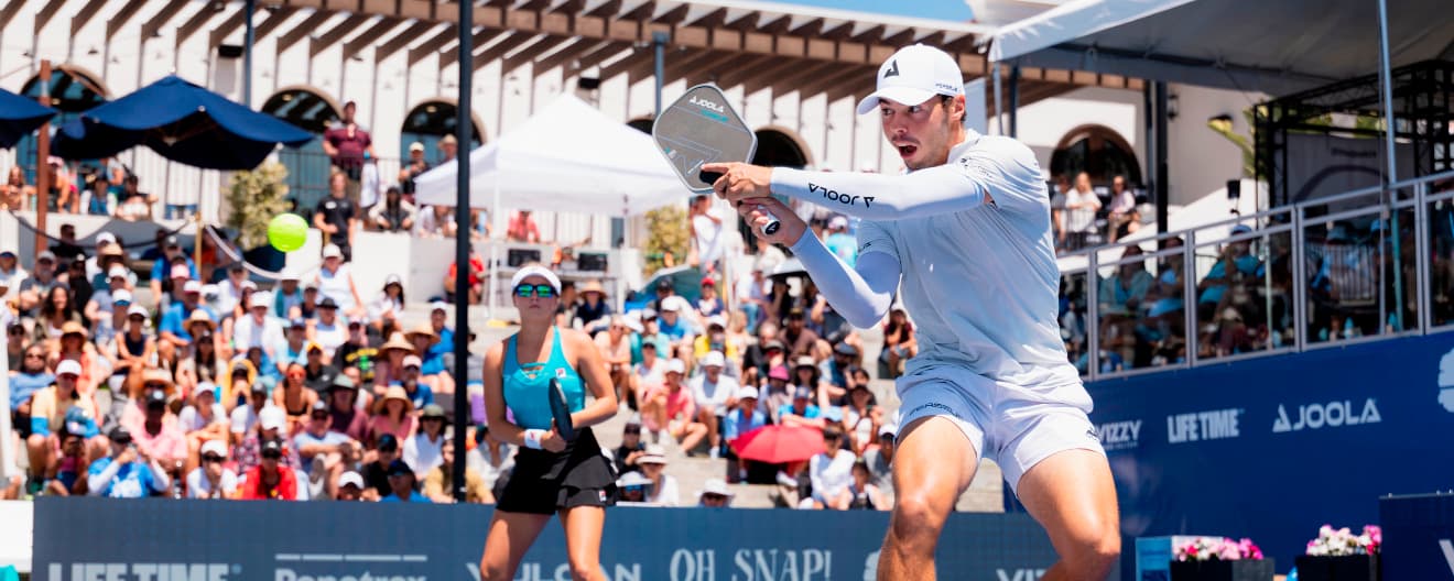 Ben Johns hits a backhand volley.