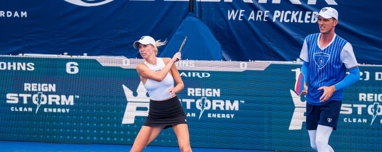 Meghan Dizon and Andrei Daescu competing at the Selkirk Kansas City Open.