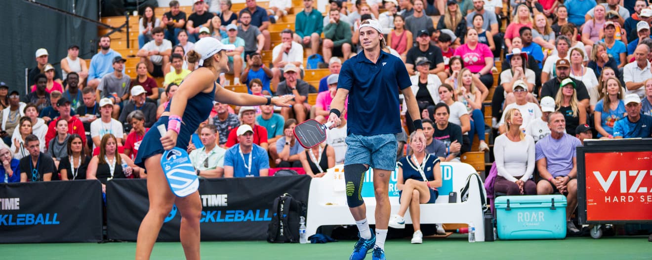 Catherine Parenteau and Christian Alshon competing at the CIBC Atlanta Slam presented by Vizzy.