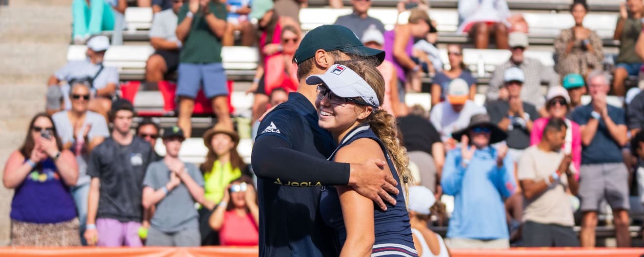 Ben Johns hugging Anna Leigh Waters after their victory.