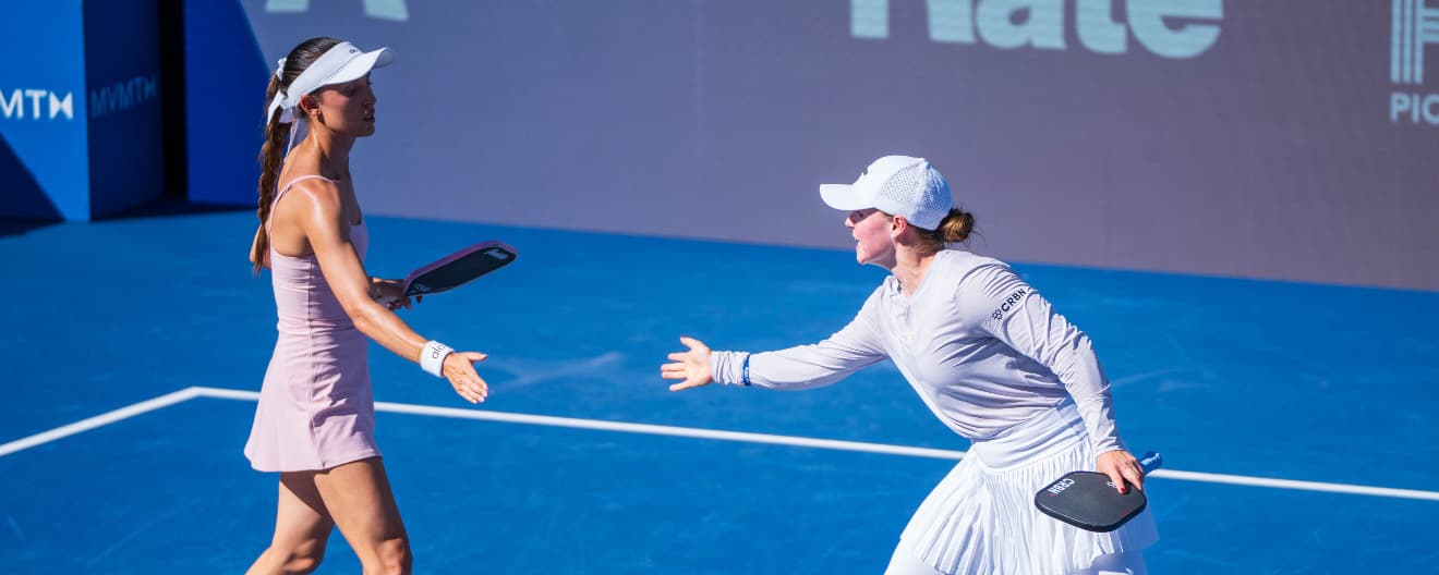 Parris Todd and Vivienne David celebrate a point at the Rate Championships presented by Skechers.